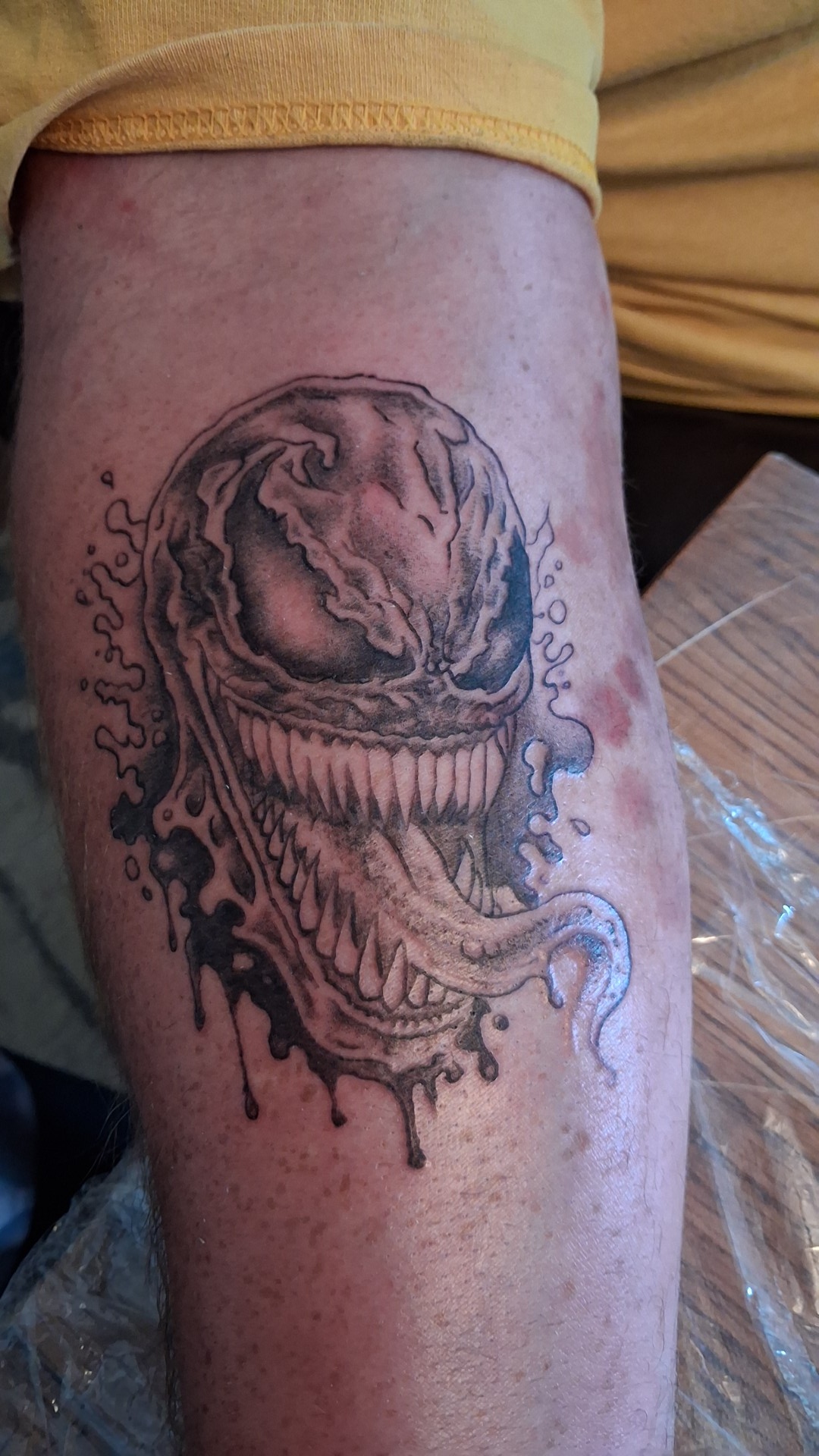 Venom black & gray calf tattoo